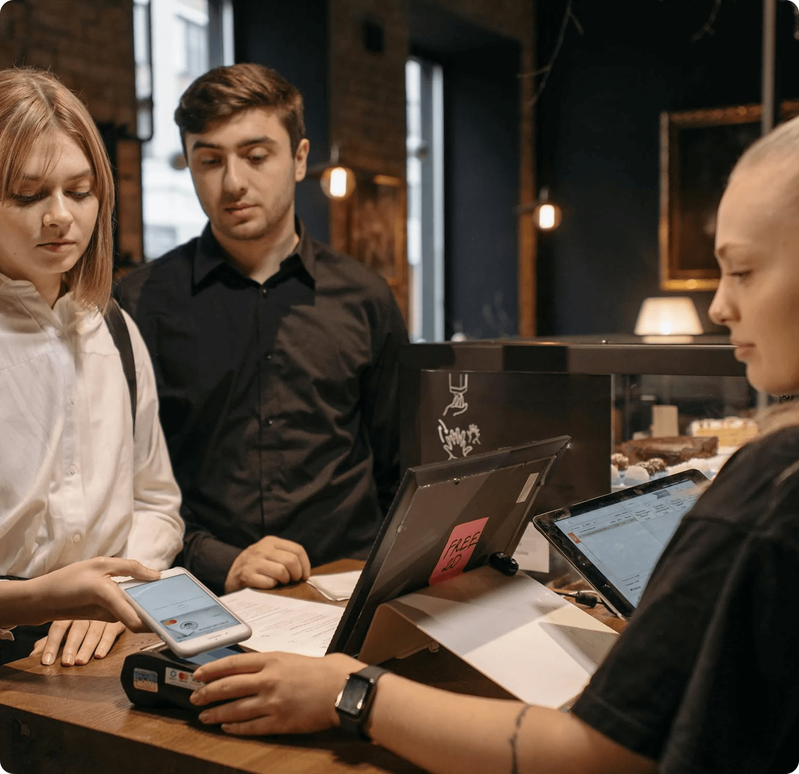 Business meeting with professionals working on laptops